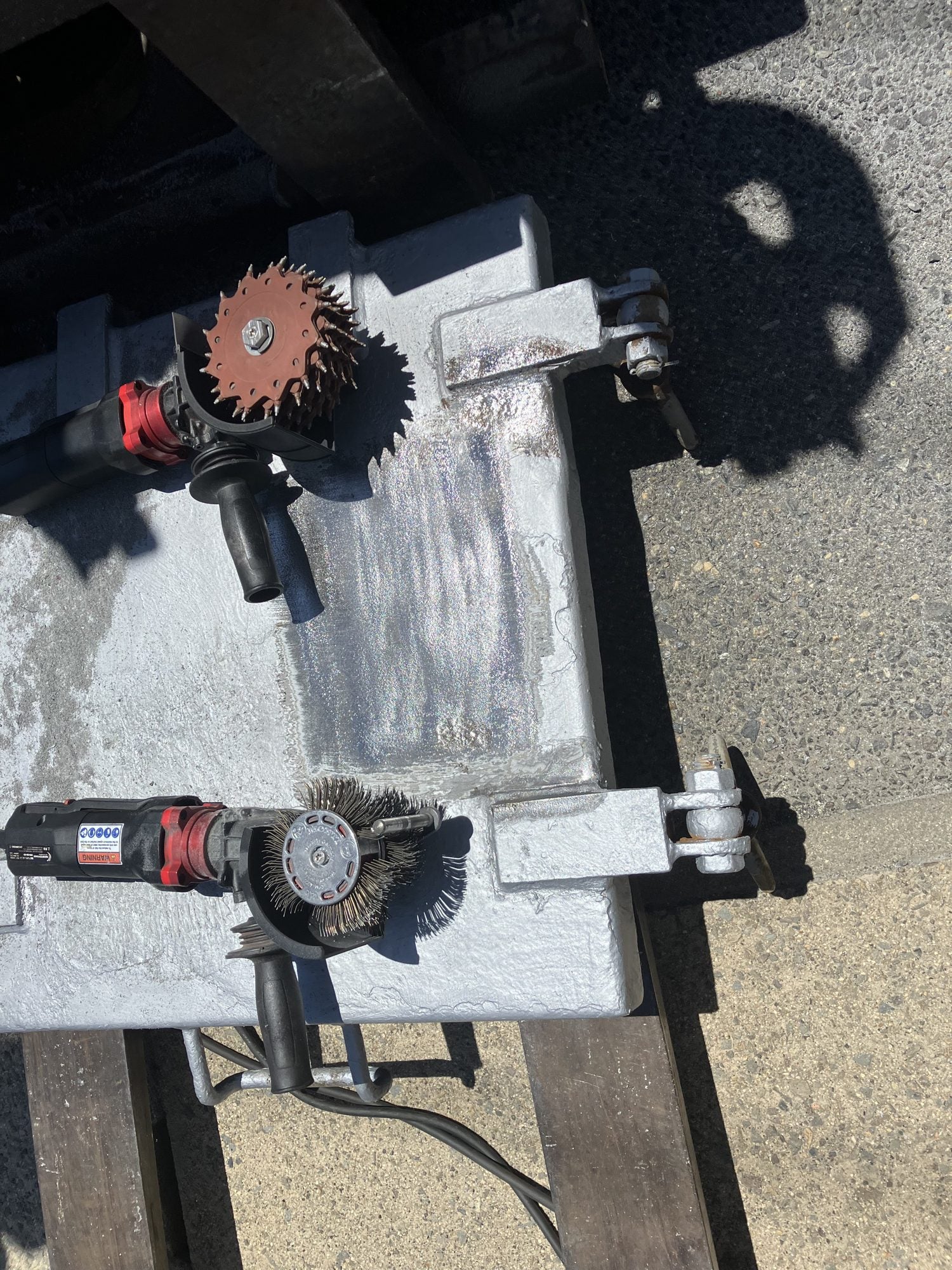 Two pneumatic Bristle Blaster Ultimate tools with disc and belt